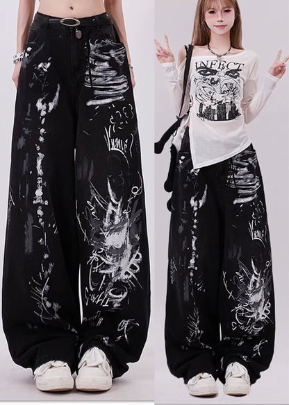 Zwarte grunge graffiti print baggy jeans