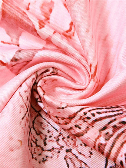 Robe mi-longue rose vintage irrégulière dos nu avec imprimé