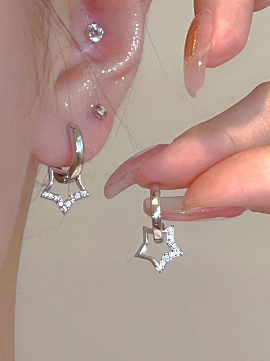 Boucles d'oreilles créoles en argent avec strass en forme d'étoile creuse