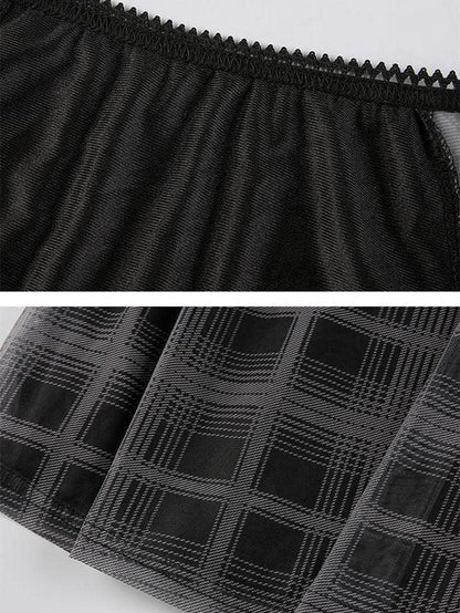 Mini-robe trapèze noire à carreaux Y2K