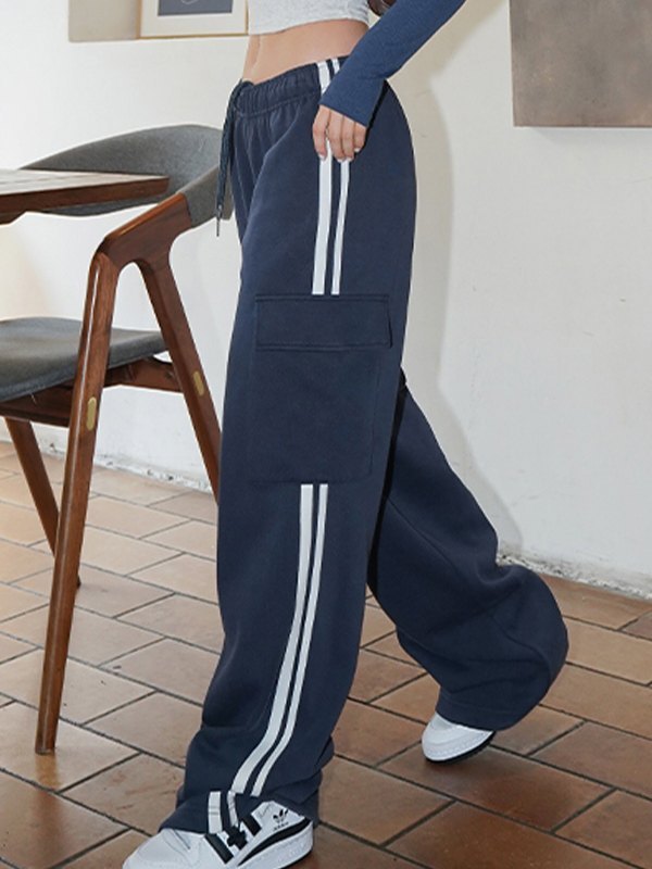 Pantalon de survêtement baggy bleu marine avec poche hip hop et rayures latérales