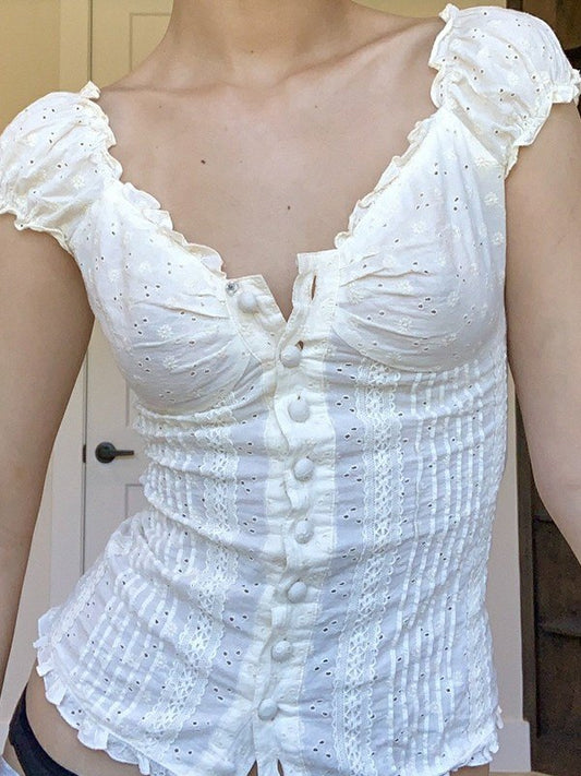 Cropped blouse van geborduurd kant met knoopsluiting