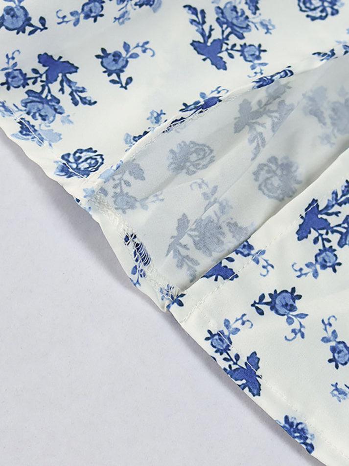 Blauwe vintage maxi-jurk met pofmouwen en bloemen