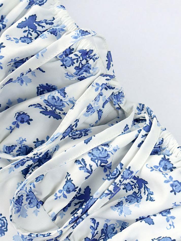 Blauwe vintage maxi-jurk met pofmouwen en bloemen