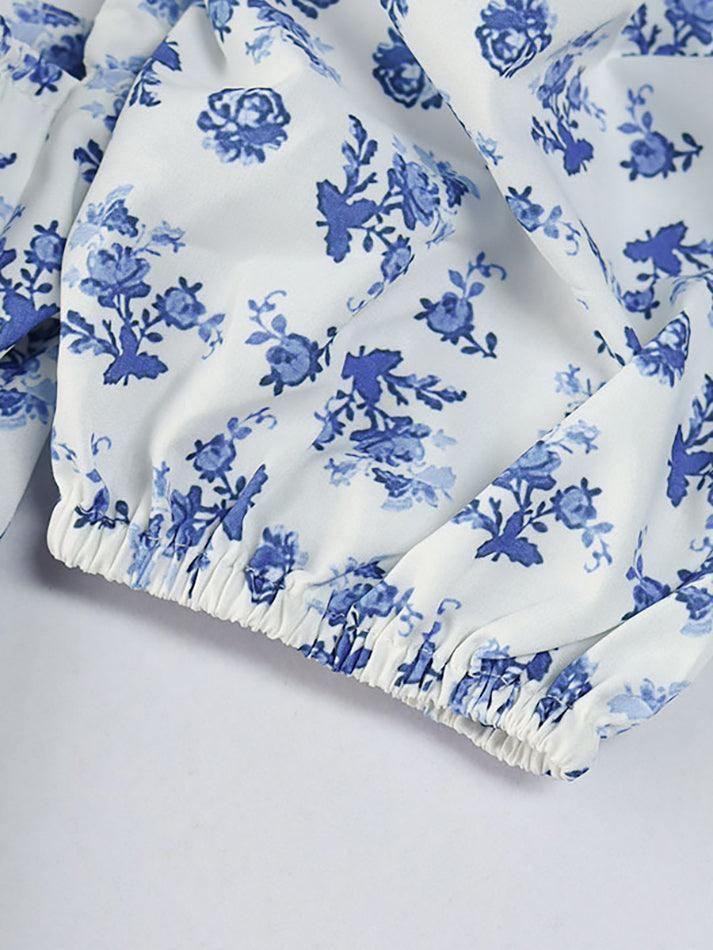 Blauwe vintage maxi-jurk met pofmouwen en bloemen